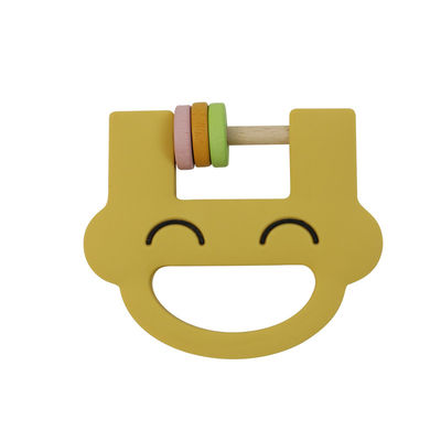 Smile Face لطيف سيليكون ألعاب أطفال سيليكون حشرجة عضاضة مع تخصيص شعار OEM ODM